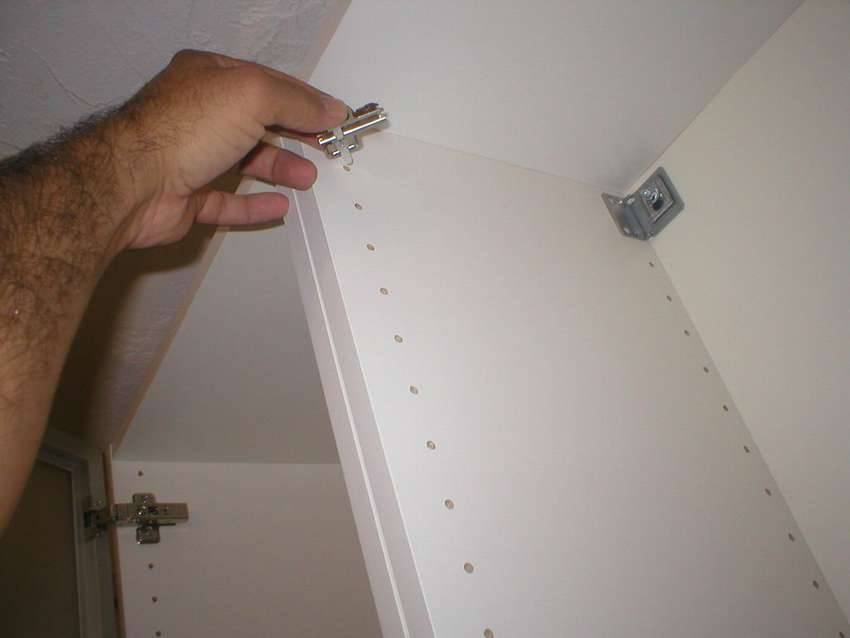 Как повесить шкаф на гипсокартонную стену: выбор крепежа