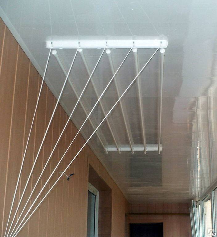 Сушилка для белья потолочная на балкон: виды конструкций, их примущества и недостатки
