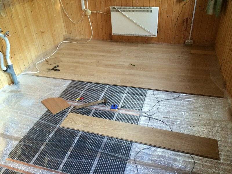 Теплый пол под ламинат на деревянный пол — инструкции по монтажу